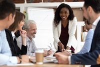 black women leading collaborative meeting